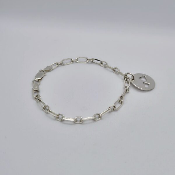 Pulsera de plata con medalla 2 corazones