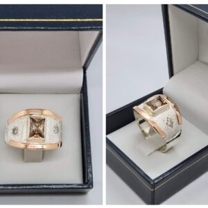 Anillo de plata y oro con piedras